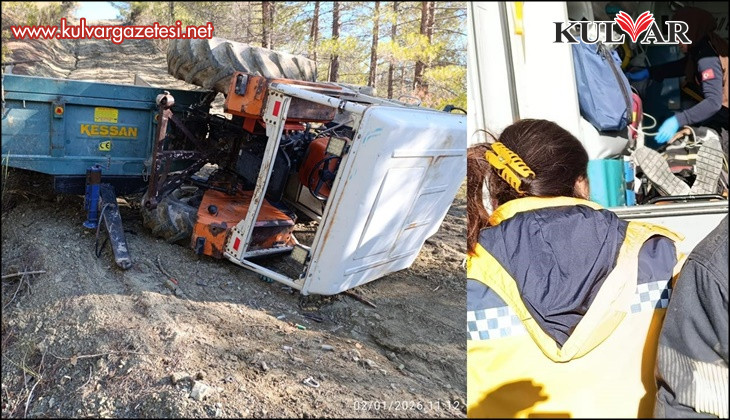 Devrilen traktör sürücüsü itfaiye tarafından kurtarıldı