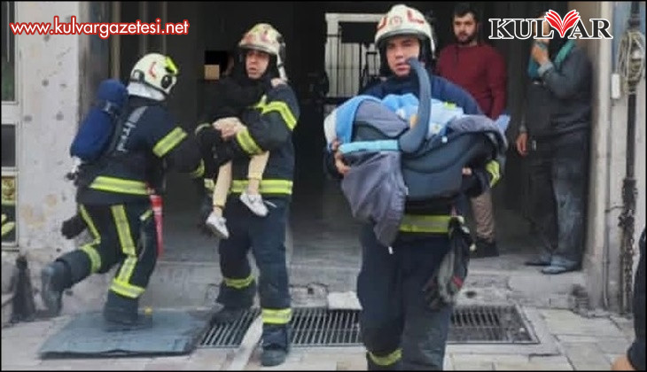 Ev olarak kullanılan iş hanında çıkan yangında 17’si çocuk 21 kişi kurtarıldı